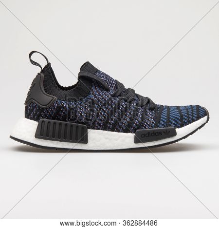 Vienna, Austria - January 12, 2018: Adidas Nmd R1 Stlt Pk Black, Pink And Blue Sneaker On White Back