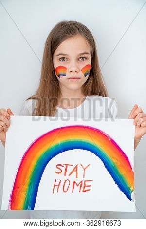 Sad Teen Girl With Blond Hair Drew A Rainbow And A Poster Stay Home. Flashmob Chasetherainbow.