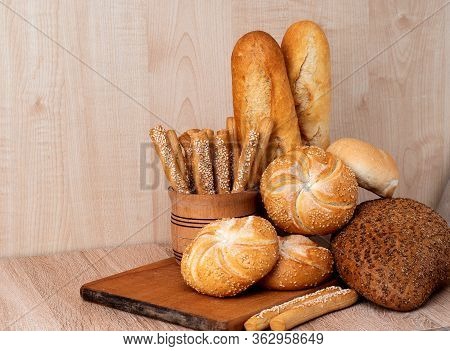 Сrisp Bread With Buns. French Baguettes. Fresh Crispbread. Bread Background. Different Breed  On Woo