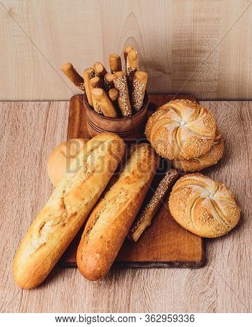Сrisp Bread With Buns. French Baguettes. Fresh Crispbread. Bread Background. Different Breed  On Woo