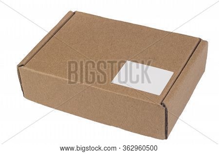 Brown Cardboard Box Closed With A Sticker Label. Isolate On A White Background. Delivery, Packaging 
