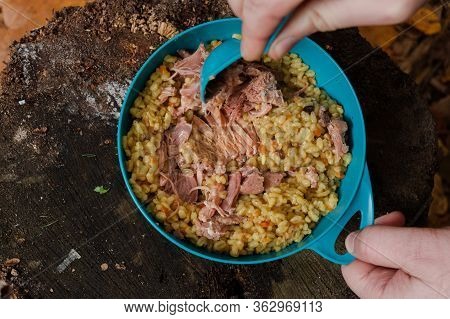 Cooked Bulgur In A Plate. Dish Of Bulgur. Cooked Bulgur With Meat. Garnish With Meat.