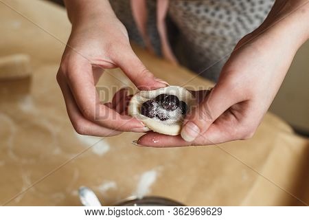 Cooking Homemade Dumplings, Female Hands Sculpting Dumpling Closeup