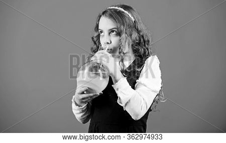 Child Study Bilogy Lesson. Small Girl Scientist With Testing Flask. Education And Knowledge. Future.