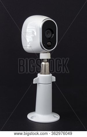 Calgary, Alberta. Canada. April 24, 2020. An Arlo Security Camera On Black Background