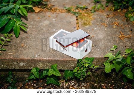 Paris, France - Apr 24, 2020: Close-up Unboxing Of The New Budget Iphone Se By Apple Computers Touch