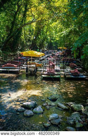 Ulupinar, Turkey - September 9, 2022: Tropic Restaurants On The River. Places On The River With Tour