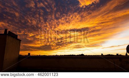 Dramatic Sunset With Chimney Pots In The Foreground. Skylie Of The City.