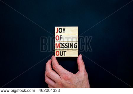Jomo Joy Of Missing Out Symbol. Concept Words Jomo Joy Of Missing Out On Wooden Blocks On A Beautifu