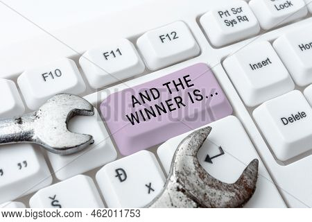 Writing Displaying Text And The Winner Is.... Business Approach Announcing Who The Victor Is Exempla