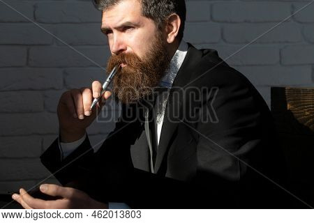 Teacher Or Professor At Classroom. Satisfied Serious Mature Teacher. Mature Professor, Middle Aged T