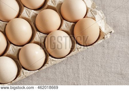 Fresh Organic Chicken Eggs In Carton Pack Or Egg Paper Container On A Sacking. Zero Waste Packaging 