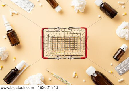 Illness Concept. Top View Photo Of Empty Shopping Cart Medicines Transparent Brown Bottles Pills Bli