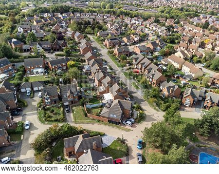 Aerial shot looking down on urban housing development - housing estate of mainly bungalows in Milton