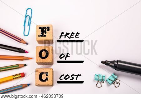 Foc - Free Of Cost. Text And Stationery On A White Background
