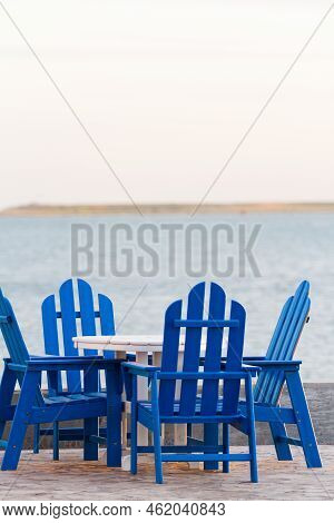 Pation With Blue Furniture On The Beach.