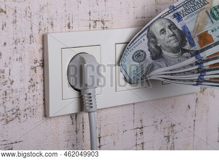 Socket And Switch In The Wall. 100 Is In It. Tariff Growth. Saving Electricity