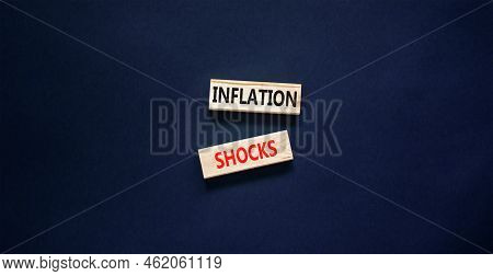 Inflation Shocks Symbol. Concept Words Inflation Shocks On Wooden Blocks. Beautiful Black Table Blac