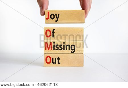 Jomo Joy Of Missing Out Symbol. Concept Words Jomo Joy Of Missing Out On Wooden Blocks On A Beautifu