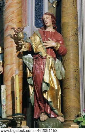 DOL, CROATIA - JULY 12, 2012: Saint John the Evangelist and Apostle, statue on the high altar in the Church of Our Lady of Dol in Dol, Croatia