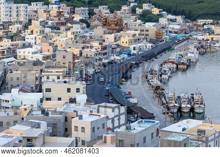 Penghu, Taiwan 27 June 2022: Xiyu township fishing village in Penghu of Taiwan at sunset
