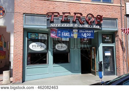 Huntington Beach, CA. - USA - September 19, 2022:  PERQS Night Club and Sports Bar in Huntington Beach California on Main Street. A world famous Huntington Beach Local Bar and Pub. 
