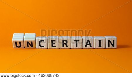 Certain Or Uncertain Symbol. Turned Wooden Cubes And Changed The Concept Word Uncertain To Certain. 