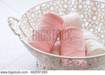 Handmade Macrame Braiding And Cotton Threads In Basket On White Background. Cotton Macrame Cords And