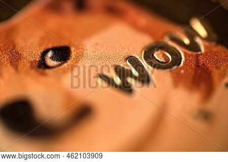 Top View Extreme Macro Closeup Of Doge Golden Meme Coin Logo With Shiba Dog And The Word Wow Written
