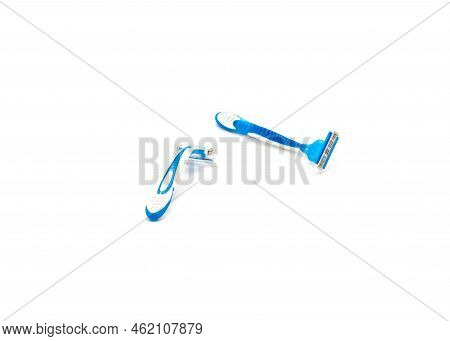 One Sharp Plastic Disposable Razor With Ergonomic Handle Has Plastic Cover And One Without Isolated