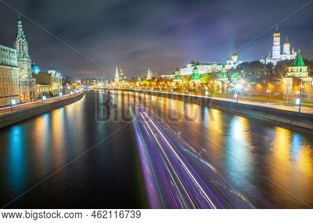 Kremlin Towers Illuminated At Evening With River Moscva Reflection, Moscow, Russia