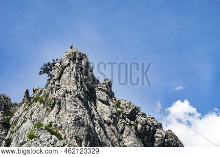 Paklenica, Croatia, Eu - June 25, 2022: Distant View Of Mountain Climbers In National Park Paklenica