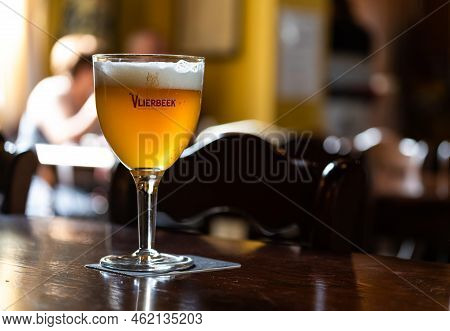 Kessel-lo, Flemish Brabant Region, Belgium, 08 21 2022 - Close Up Of An Amber Abbey Beer Called Vlie