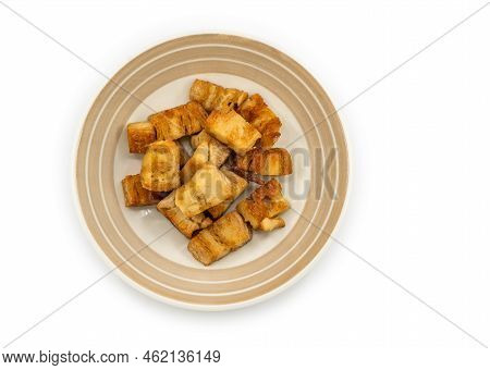 Isolated Base-plant Crispy Pork In Beautiful Dish On White Background, Meat Zero Food, Top View Imag