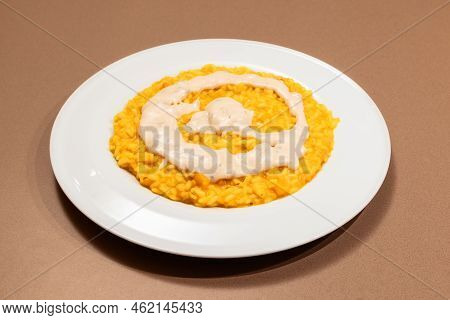 Plate Of сreamy Gorgonzola Risotto With Pumpkin. Traditional Italian Recipe
