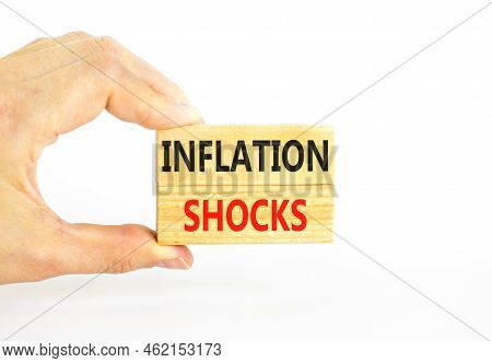Inflation Shocks Symbol. Concept Words Inflation Shocks On Wooden Blocks. Beautiful White Table Whit