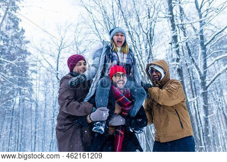 Outdoor Lifestyle Portrait Of Four Best Friends, Smiling And Having Fun Together