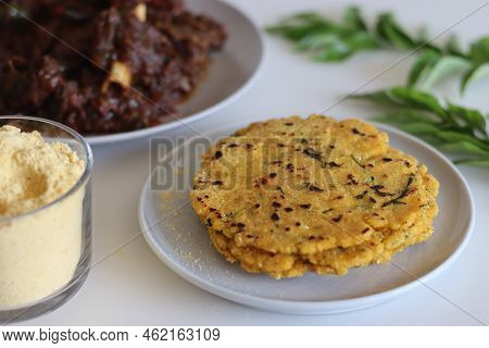 Makki Ki Roti Or Maize Roti Served With Mutton Roast. An Indian Flat Unleavened Bread Made From Corn
