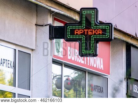Koszalin, Poland - August 5, 2022: Cross Logo Apteka (pharmacy In English) At Storefront In Poland