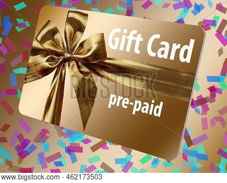 A Pre-paid Gift Card Is Seen Here. It Is Gold With A Gold Ribbon Design On The Front. Confetti Is Se