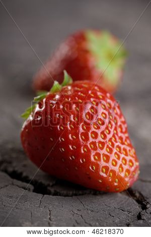 Fresh Strawberries On Old Wooden Background