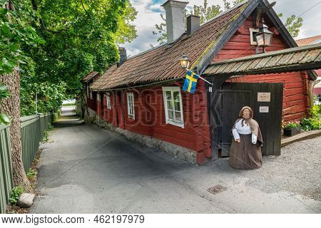 Sigtuna, Sweden - 09.02.2022: Very Old Red Traditional Wooden House In The Side Street Of Sigtuna, T