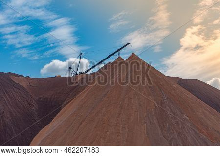 Mining Industry Close Up. Telestacker Handles The Ore Closeup For Potash Waste Heaps, Extraction Of 