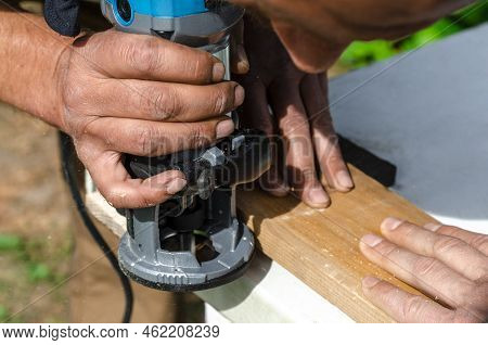 Woodworking Shank Router Bit. Shaping Copying Shank Router Bit Clamped In Chuck Of A Working Machine
