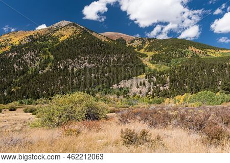 12,674 Foot Parry Peak And 13,588 Foot Mt. Cosgriff Rise Above The Forest Near Twin Lakes.