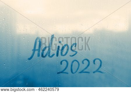Lettering Adios In Spanish Is Goodbye In English And Numbers 2022 Paint With Finger Of Water On Spla