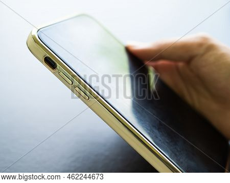 Finger Woman Holding Mobile Phone Close Up With Overlight On Black Background,smartphone Touch Scree