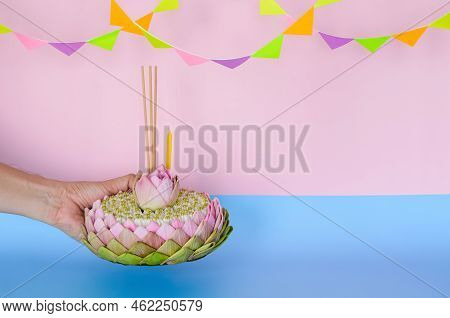 Pink Lotus Petal Krathong That Have 3 Incense Sticks And Candle Decorates With Lotus And Crown Flowe