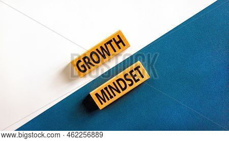 Growth Mindset Symbol. Wooden Blocks With Concept Words Growth Mindset On Beautiful White And Blue B