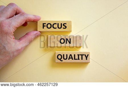 Focus On Quality Symbol. Concept Words Focus On Quality On Blocks On Beautiful White Table White Bac
